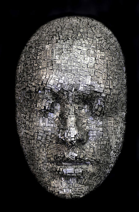 Masks and heads made from moveable type and steel hardware by Dale Dunning