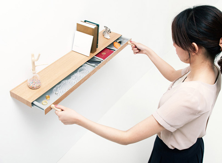 Clopen shelf doubles as a secret drawer