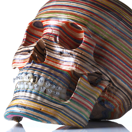 A skull made from repurposed skateboard decks