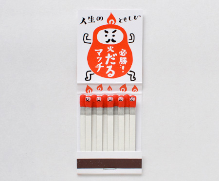 Individually hand-stamped kokeshi matches