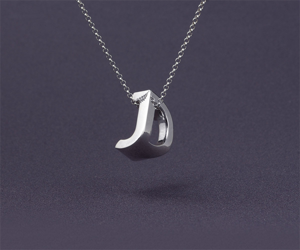 3D printed typographic monogram jewelry