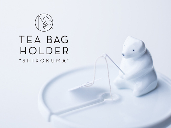 A teabag holder that looks like a fishing polar bear