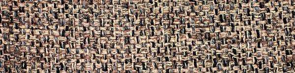 Macro of loose knitted brown fabric texture