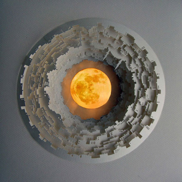 Circular paper cut scenes by Nermin Er