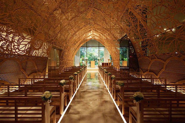 Power of flower: a wedding chapel made with 100 carved wood panels