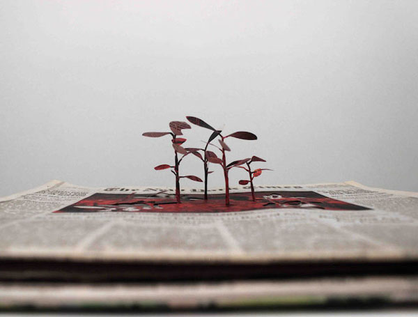 Minding my own business: newspaper cutouts by Yuken Teruya