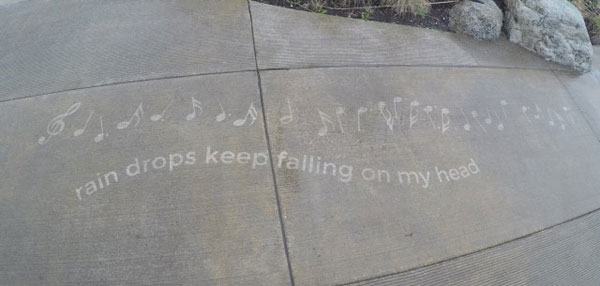 Illustrations-on-Sidewalks-Appear-When-Raining_6-640x305