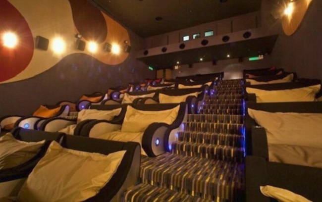 A movie theater with giant bean bags