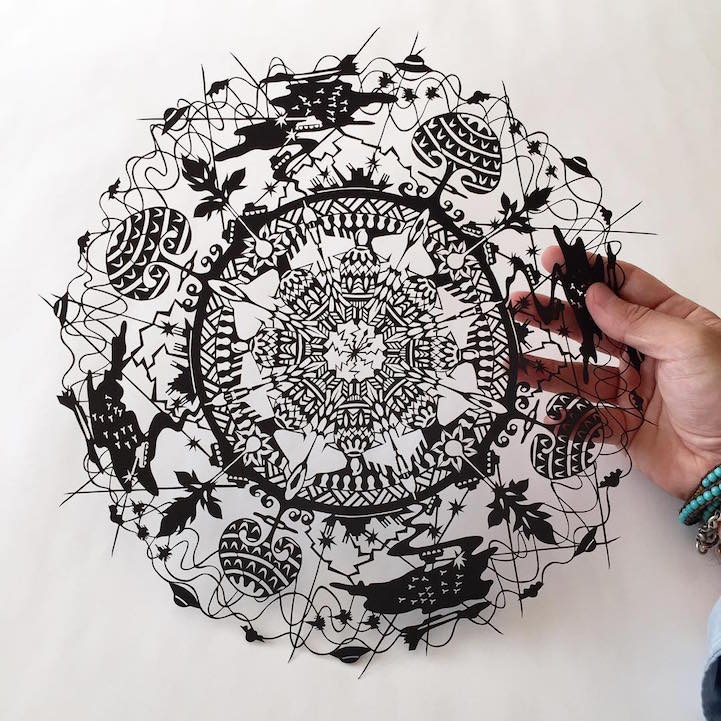 Mr Riu creates amazingly detailed paper cuts