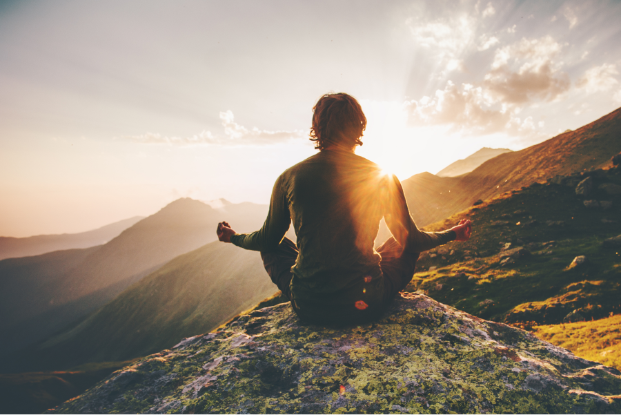 A man is meditating.